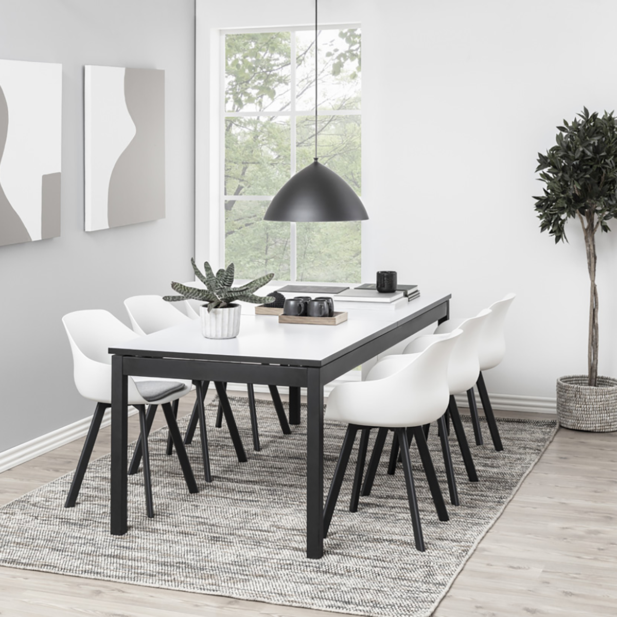 Rene kunststof eetkamerstoel wit - zwart metalen onderstel - kuipstoel