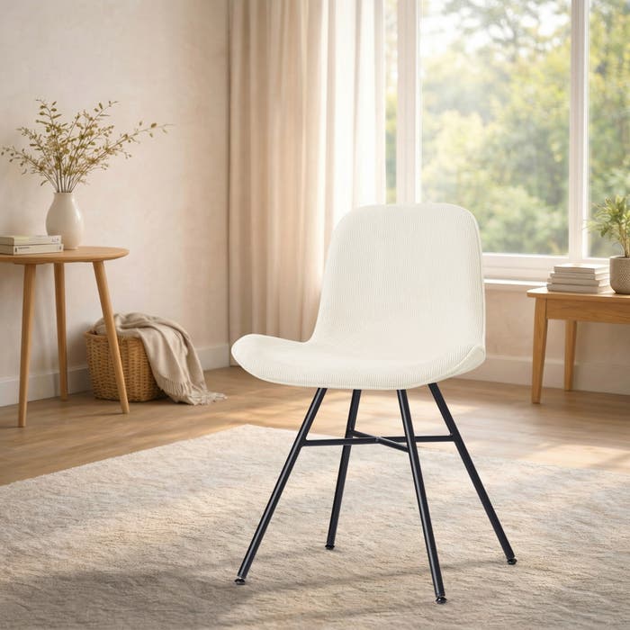 Noa-Fé eetkamerstoel rib beige - zwart onderstel - japandi - comfortabel - gestoffeerd - rugleuning - metalen onderstel