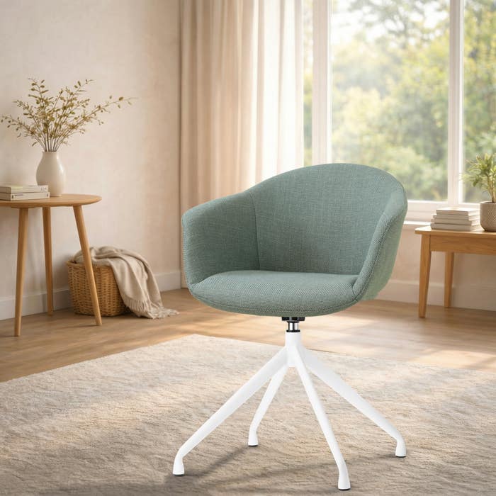 Nola-Otis draaibare eetkamerstoel saliegroen - wit onderstel - japandi - gestoffeerd - armleuningen - comfortabel - metalen onderstel