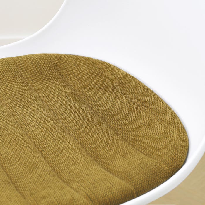 detail van de warm groen zitkussen - wit onderstel  - wit noa-liv