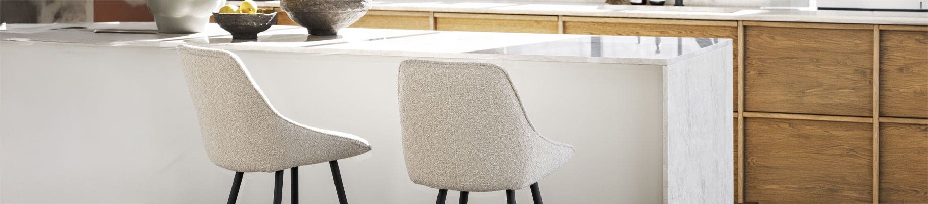 Bouclé barkrukken voegen textuur en comfort toe aan je interieur